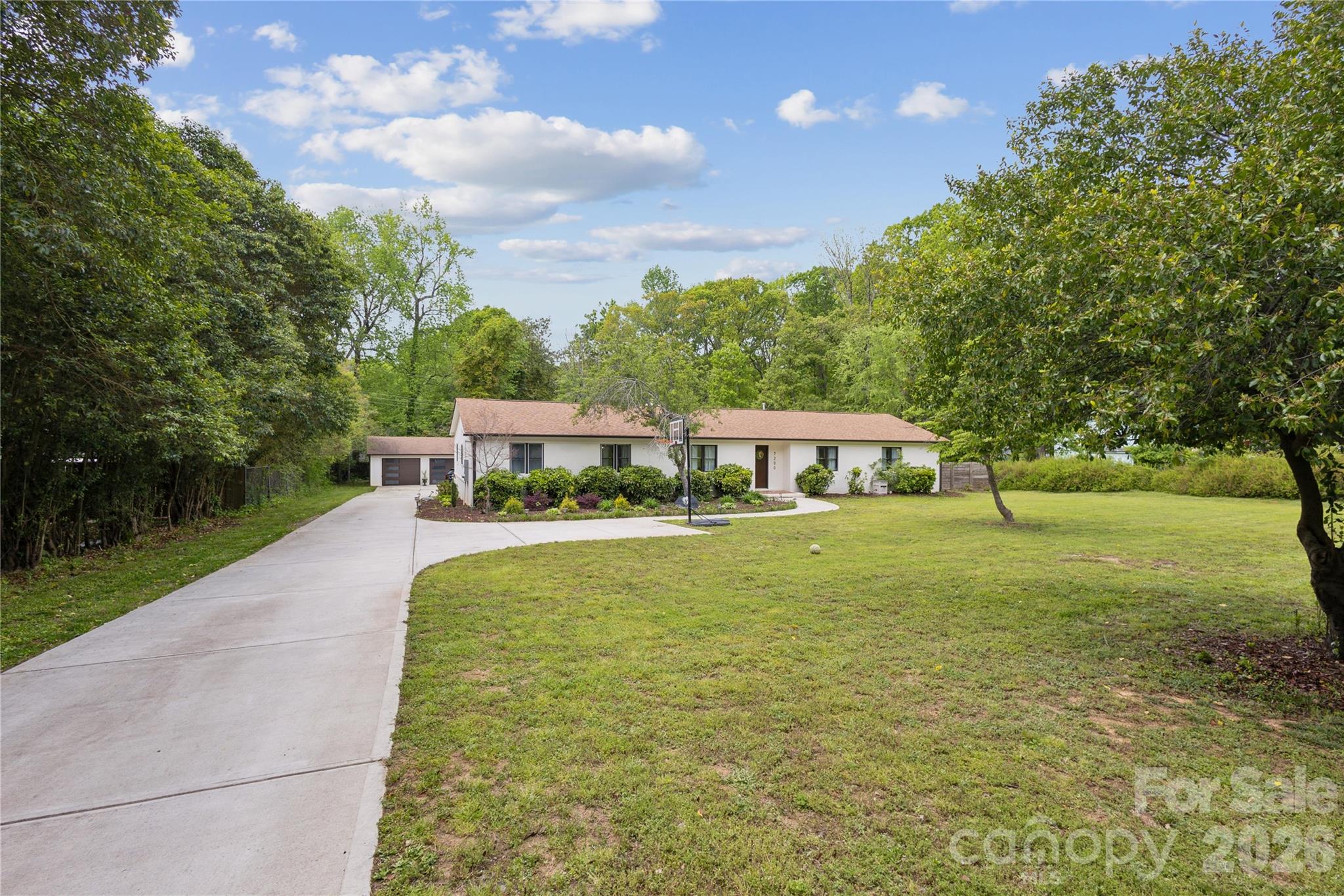 7200 Monroe Road Charlotte, NC 28212 - Photo 2 of 37 a view of a house with a yard