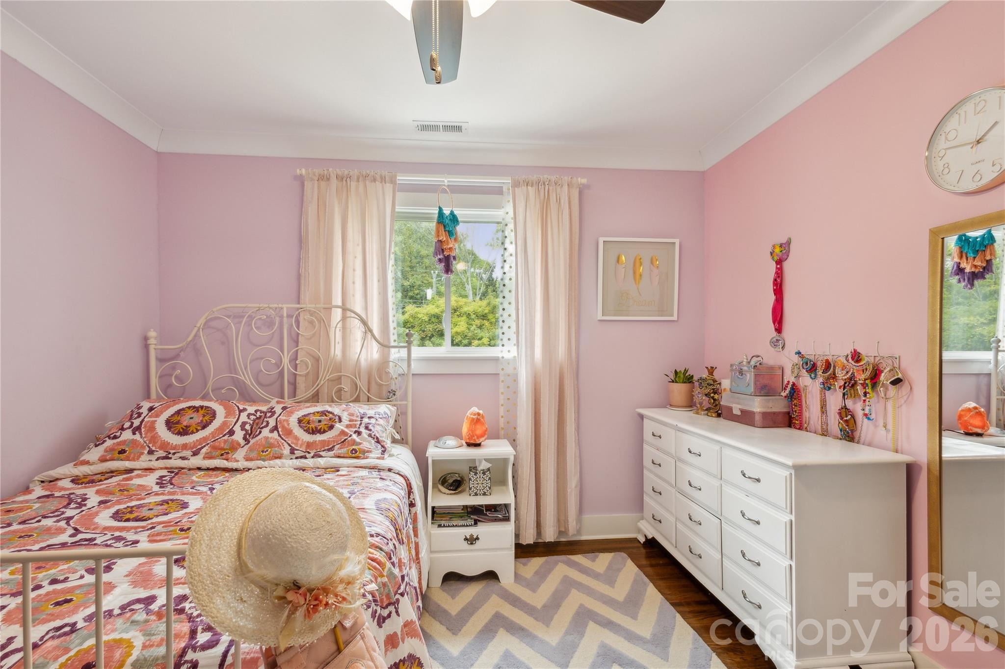 7200 Monroe Road Charlotte, NC 28212 - Photo 24 of 37 a bed room with a bed and a window