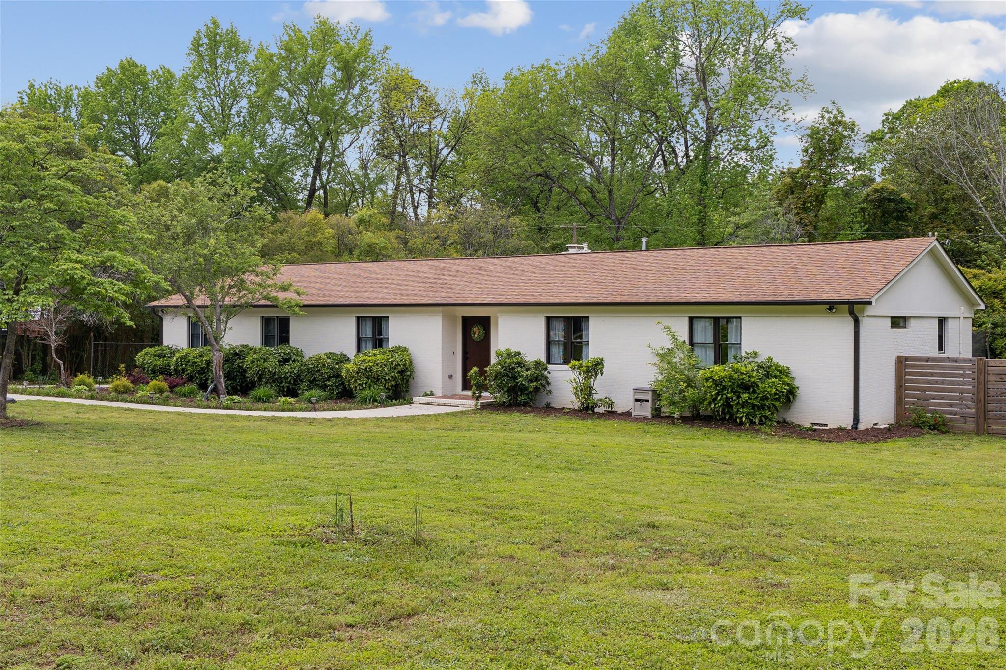 7200 Monroe Road Charlotte, NC 28212 - Photo 37 of 37 a front view of a house with garden