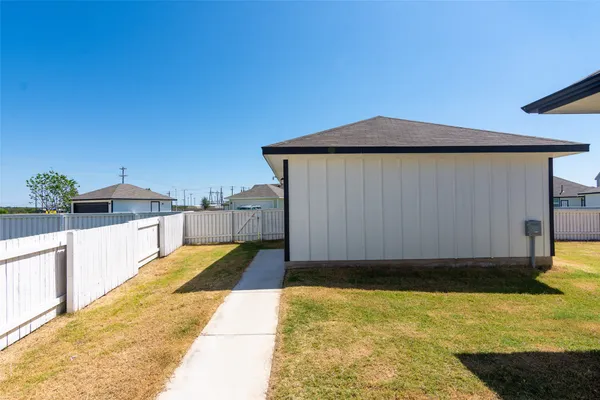 a view of a swimming pool with chair