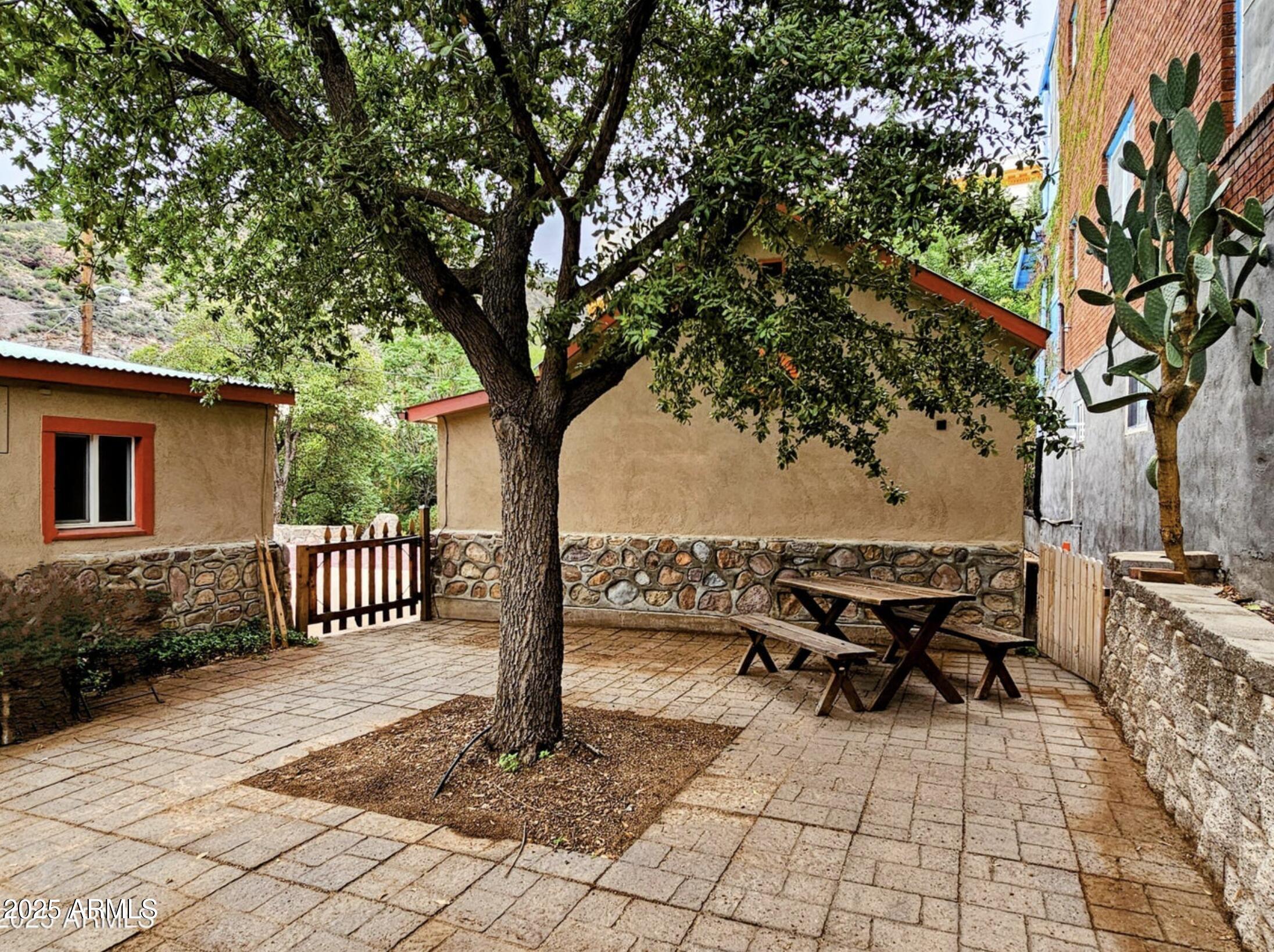 25 Cole Avenue Bisbee, AZ 85603 - Photo 14 of 15 a view of a backyard with sitting area