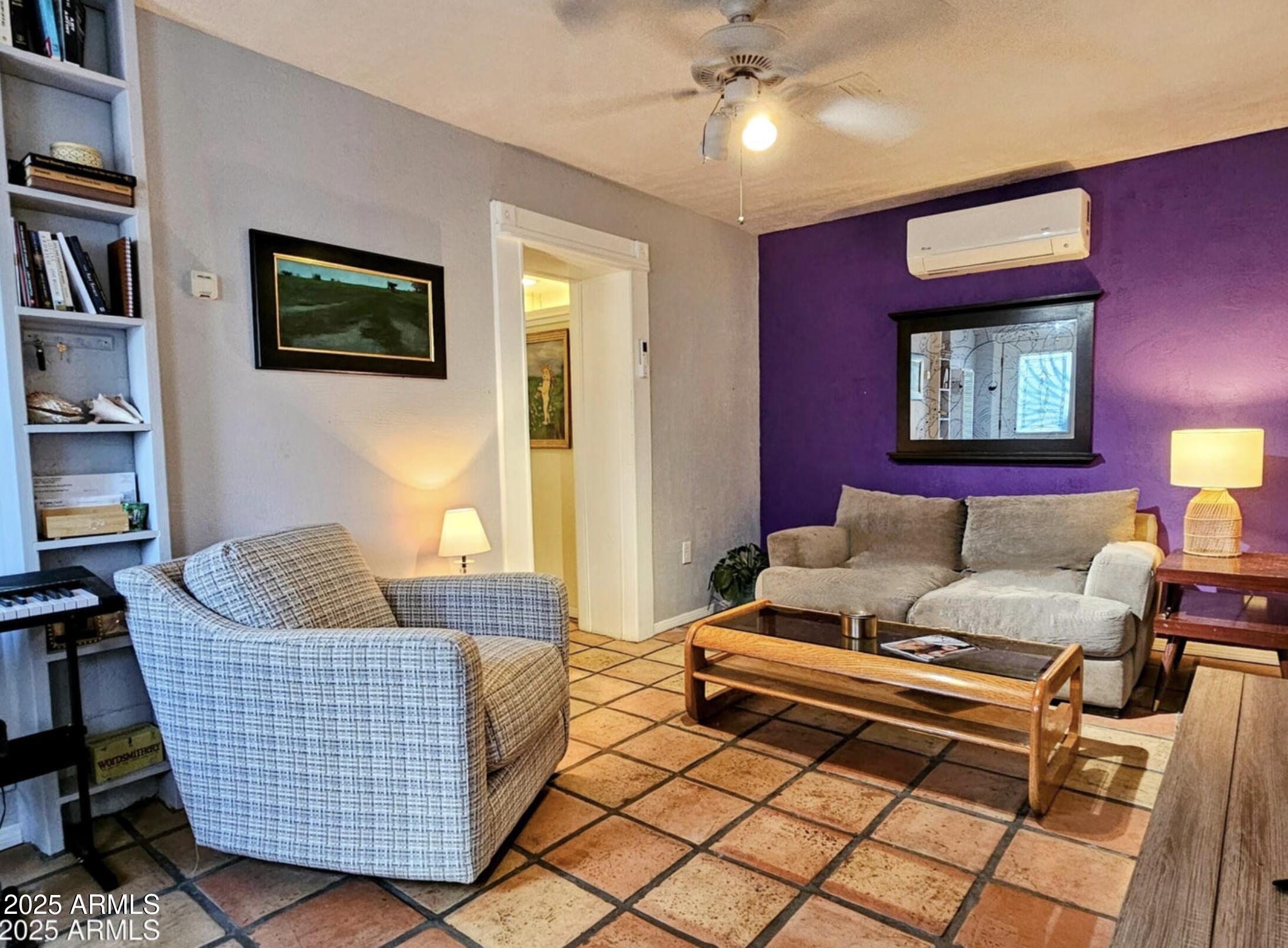 25 Cole Avenue Bisbee, AZ 85603 - Photo 4 of 15 a living room with furniture and a couch