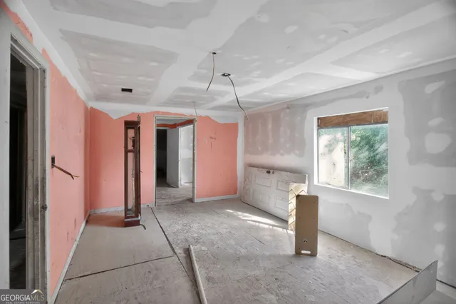 a view of livingroom with hardwood floor and a ceiling fan