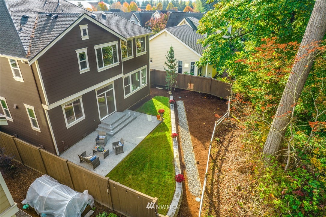 3318 238th Place Southeast Bothell, WA 98021 - Photo 30 of 36 a view of an house with a yard