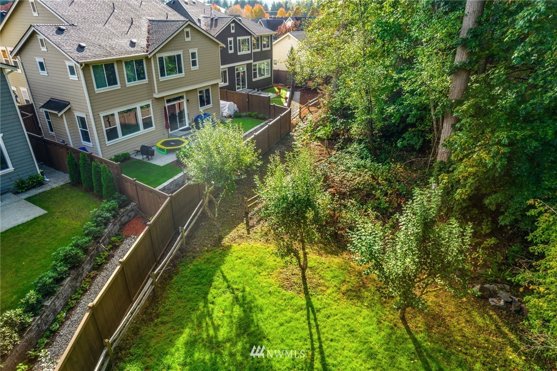 3318 238th Place Southeast Bothell, WA 98021 - Photo 31 of 36 a aerial view of a house with a yard
