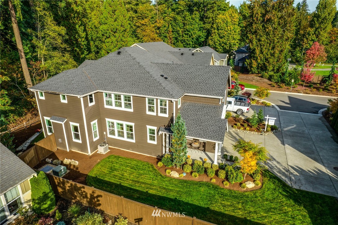 3318 238th Place Southeast Bothell, WA 98021 - Photo 32 of 36 an aerial view of a house with garden