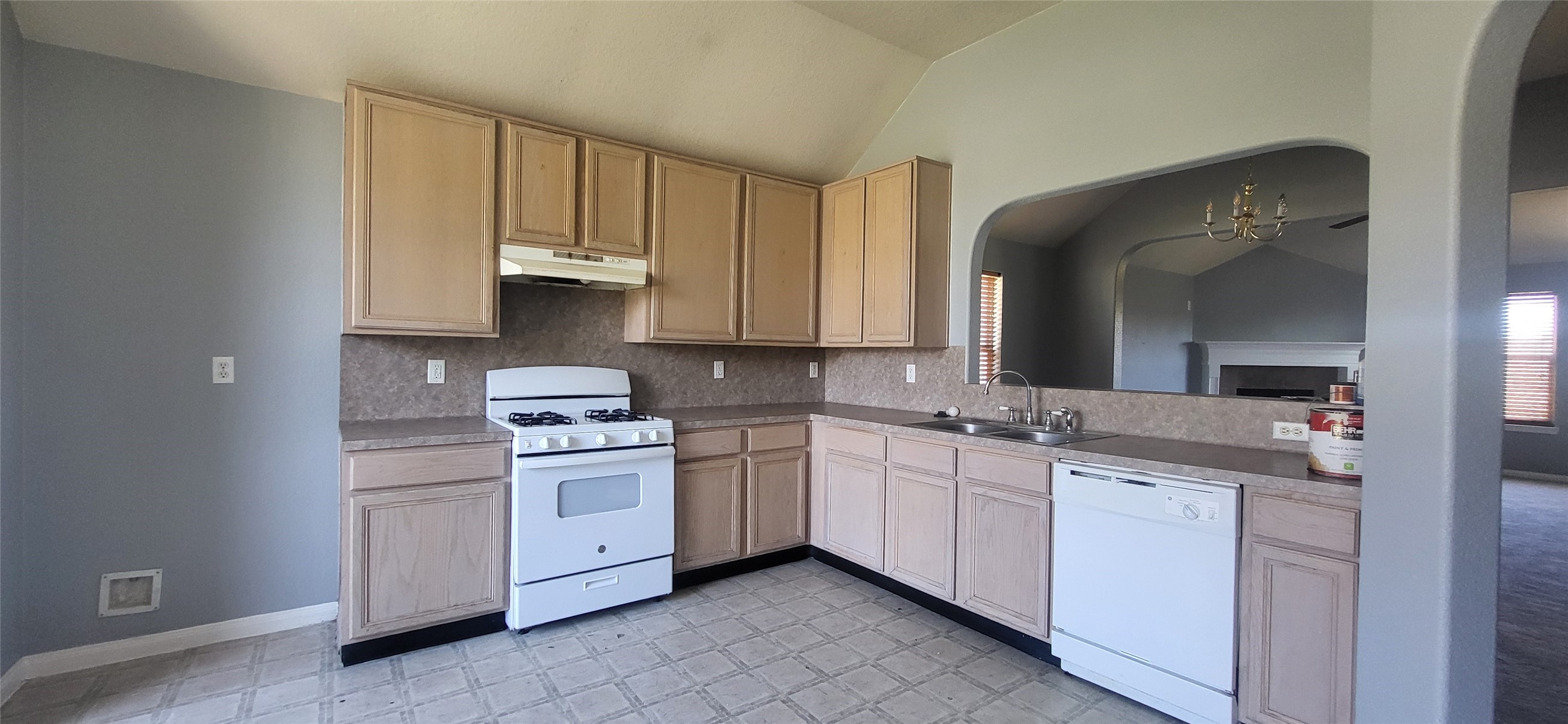 24022 Rockygate Drive Spring, TX 77373 - Photo 4 of 12 a kitchen with stainless steel appliances granite countertop white cabinets and sink
