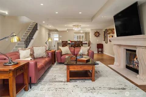 a kitchen with stainless steel appliances granite countertop a sink and cabinets