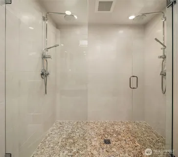 a view of a bedroom with furniture and window