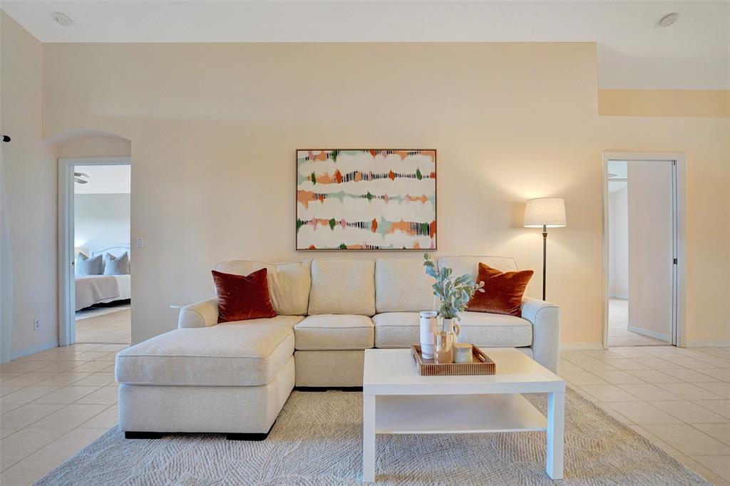 7219 Modena Drive Boynton Beach, FL 33437 - Photo 11 of 47 a living room with furniture and a lamp