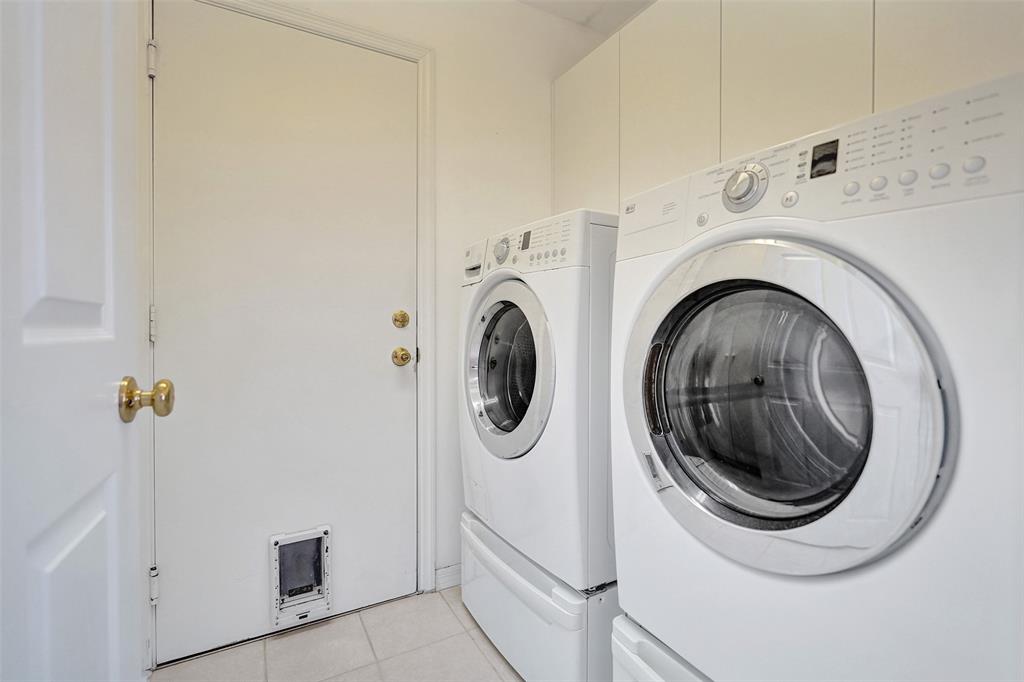 7219 Modena Drive Boynton Beach, FL 33437 - Photo 33 of 47 a utility room with dryer and washer