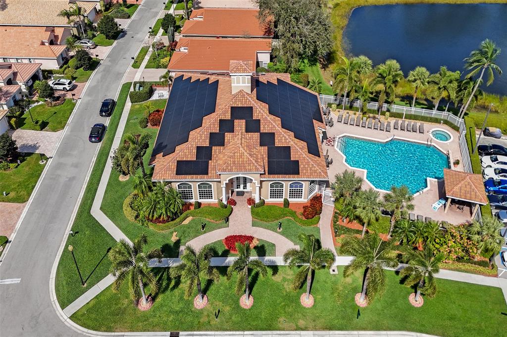 7219 Modena Drive Boynton Beach, FL 33437 - Photo 37 of 47 an aerial view of multiple houses with a yard