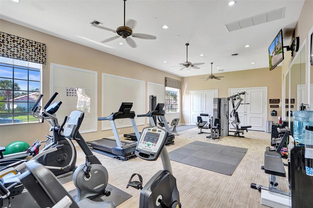 7219 Modena Drive Boynton Beach, FL 33437 - Photo 40 of 47 a view of a room with gym equipment