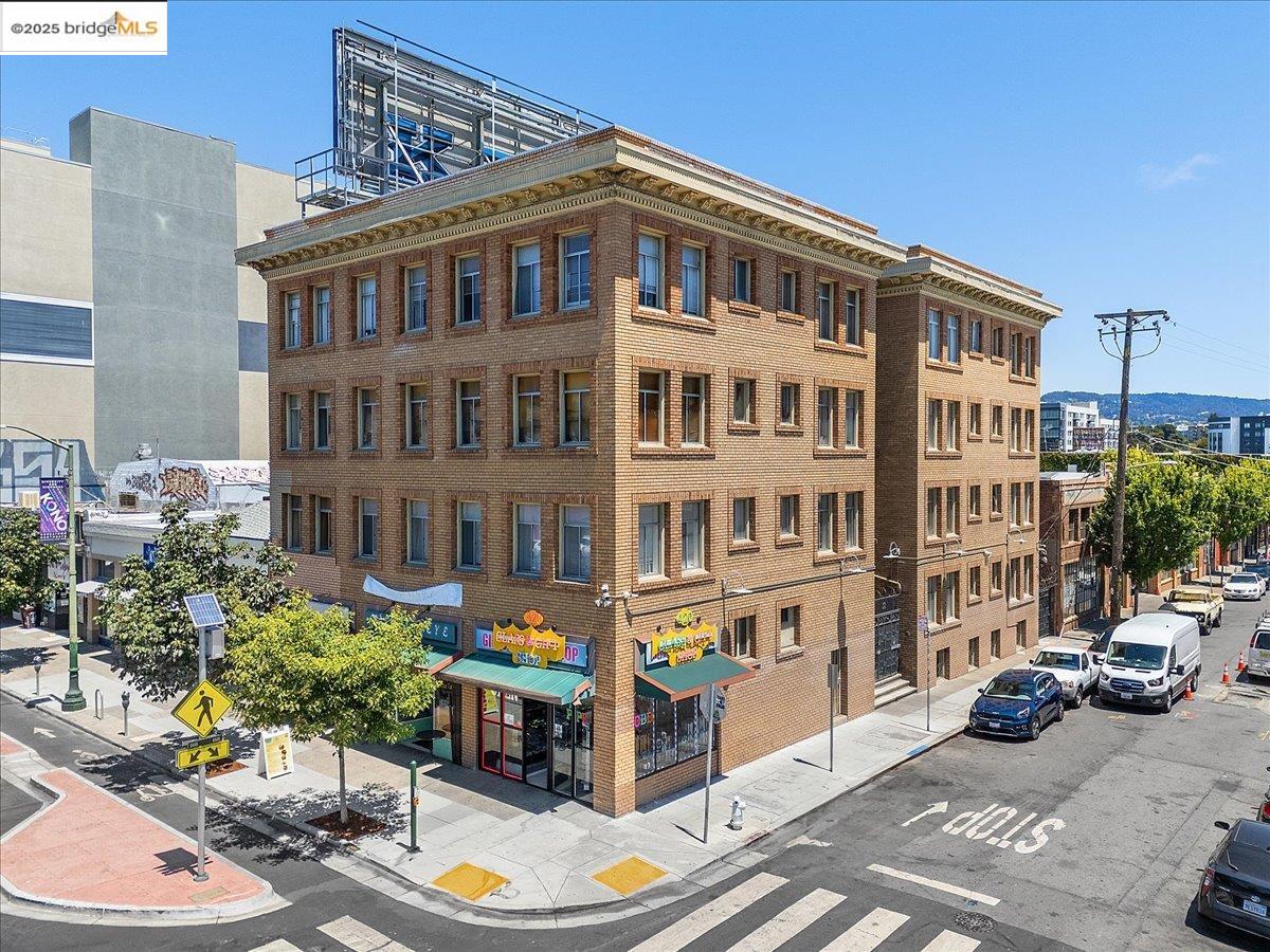 498 25th Street Oakland, CA 94612 - Photo 1 of 44 a front view of a building with street view