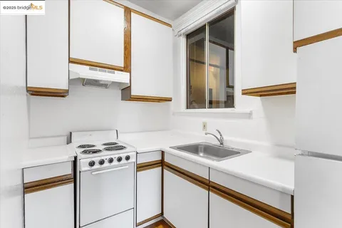 a bathroom with a sink a mirror and a bathtub
