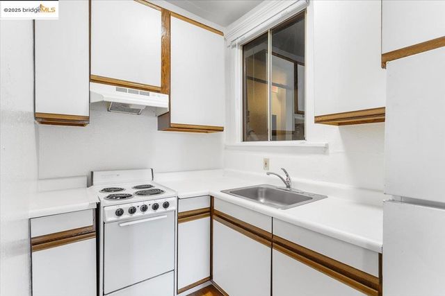 a bathroom with a sink a mirror and a bathtub