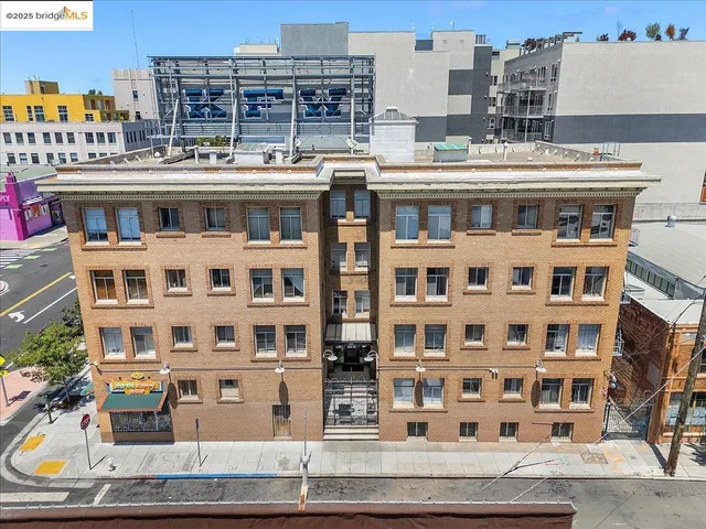 a front view of a building with glass windows