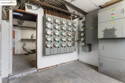 a kitchen with granite countertop a sink and cabinets