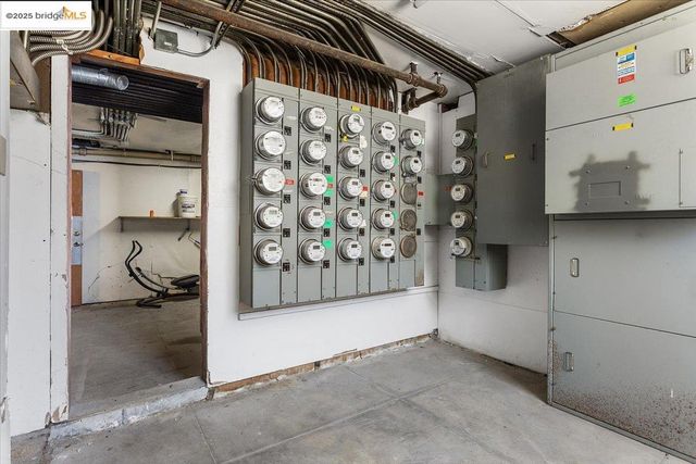 a kitchen with granite countertop a sink and cabinets