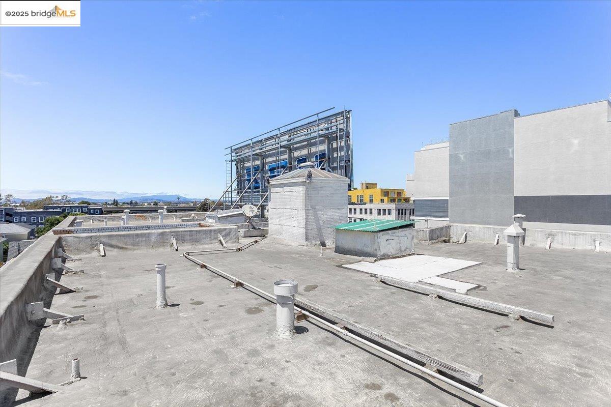 498 25th Street Oakland, CA 94612 - Photo 39 of 44 a terrace with a bench and a couch