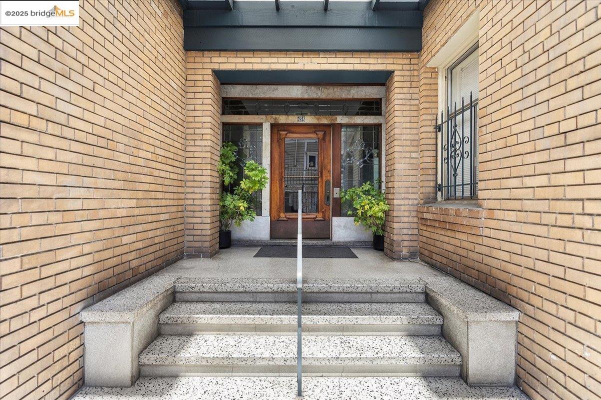 498 25th Street Oakland, CA 94612 - Photo 5 of 44 a view of a entryway door front of house