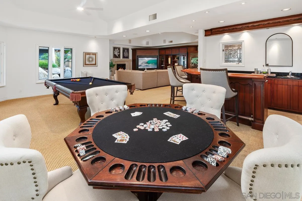 6281 Avenida Loma De Oro Rancho Santa Fe, CA 92067 - Photo 14 of 40 a living room with furniture and a wooden floor