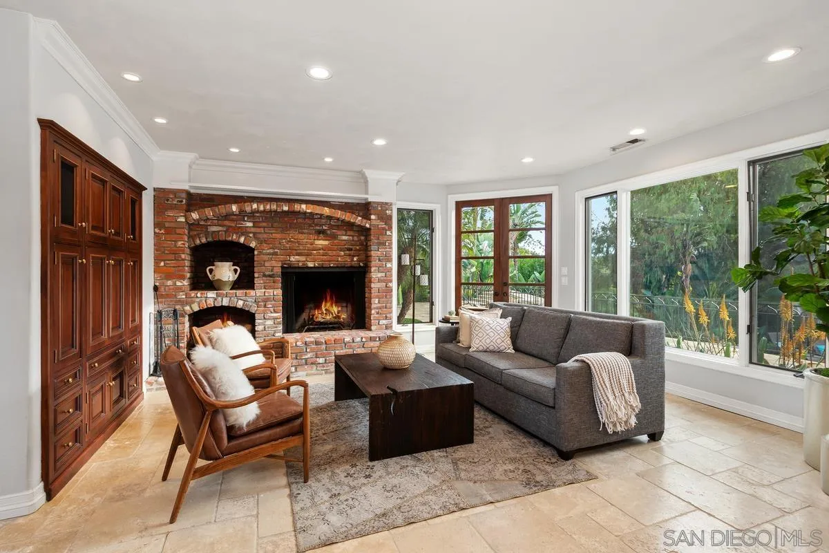 6281 Avenida Loma De Oro Rancho Santa Fe, CA 92067 - Photo 21 of 40 a living room with furniture and a fireplace