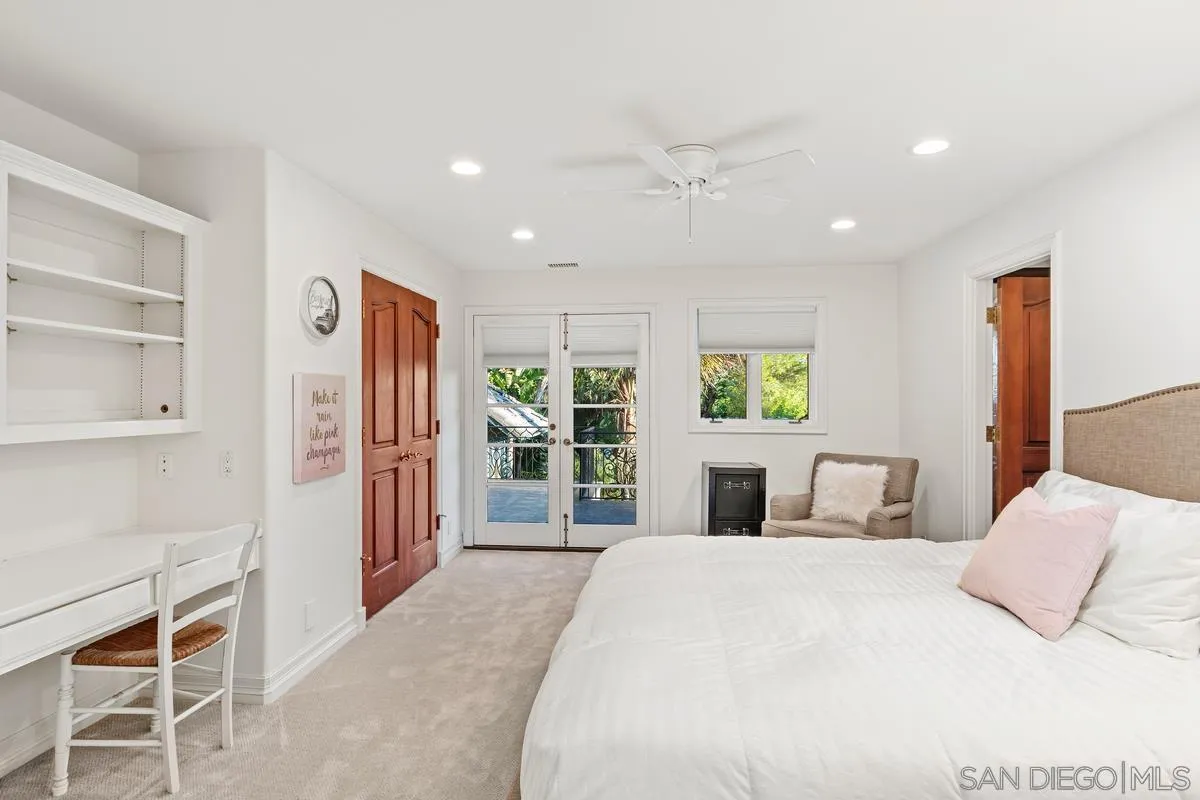6281 Avenida Loma De Oro Rancho Santa Fe, CA 92067 - Photo 28 of 40 a bedroom with a large bed and a window