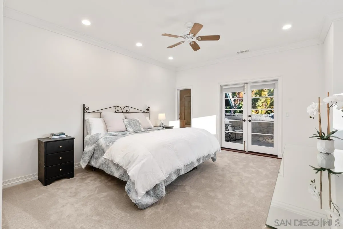 6281 Avenida Loma De Oro Rancho Santa Fe, CA 92067 - Photo 29 of 40 a bedroom with a bed and a view of en suite bathroom