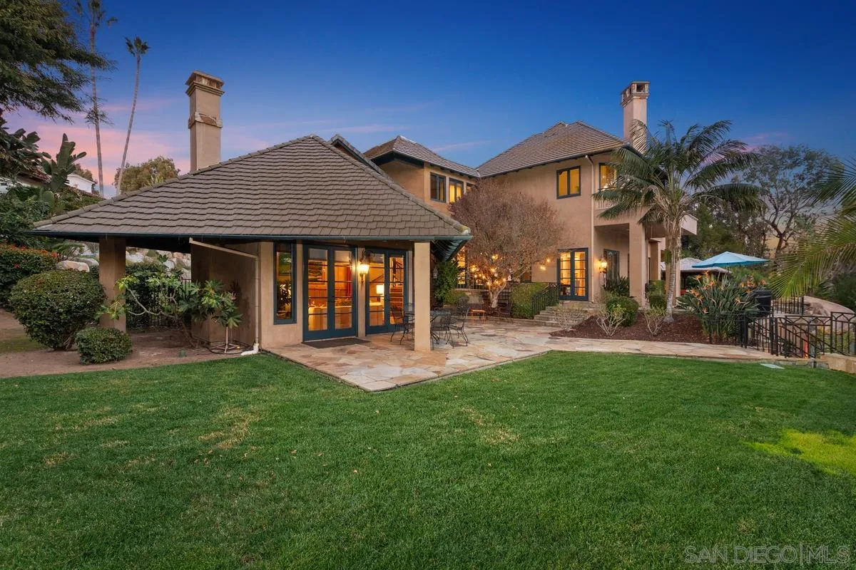 6281 Avenida Loma De Oro Rancho Santa Fe, CA 92067 - Photo 7 of 40 a front view of a house with a yard