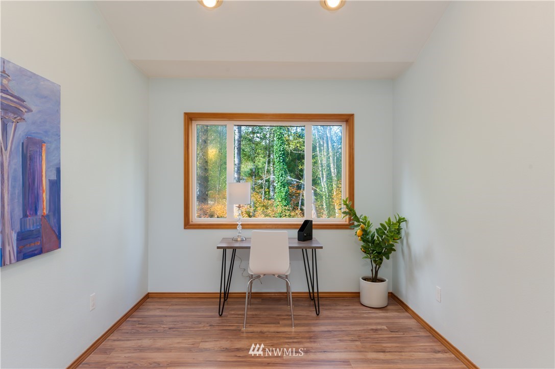 1220 Southwest 12th Street North Bend, WA 98045 - Photo 17 of 25 a view of a room that has a window and wooden floor