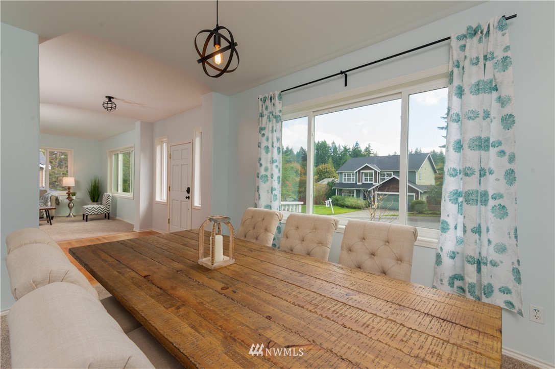 1220 Southwest 12th Street North Bend, WA 98045 - Photo 5 of 25 a living room with couch