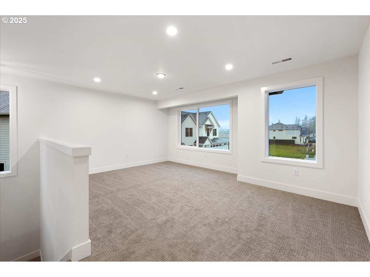 3510 North 11th Circle Ridgefield, WA 98642 - Photo 24 of 47 a view of an empty room with a window