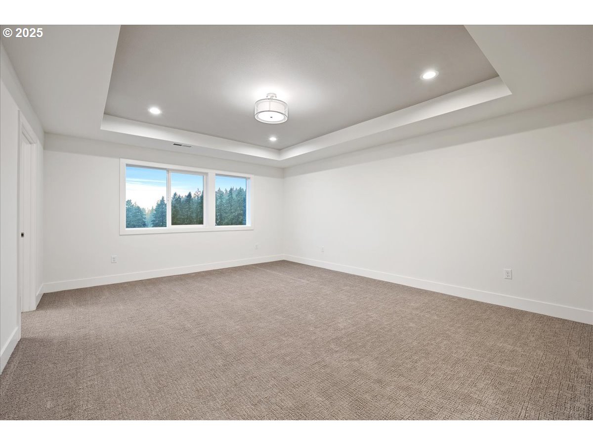 3510 North 11th Circle Ridgefield, WA 98642 - Photo 27 of 47 a view of an empty room with a window