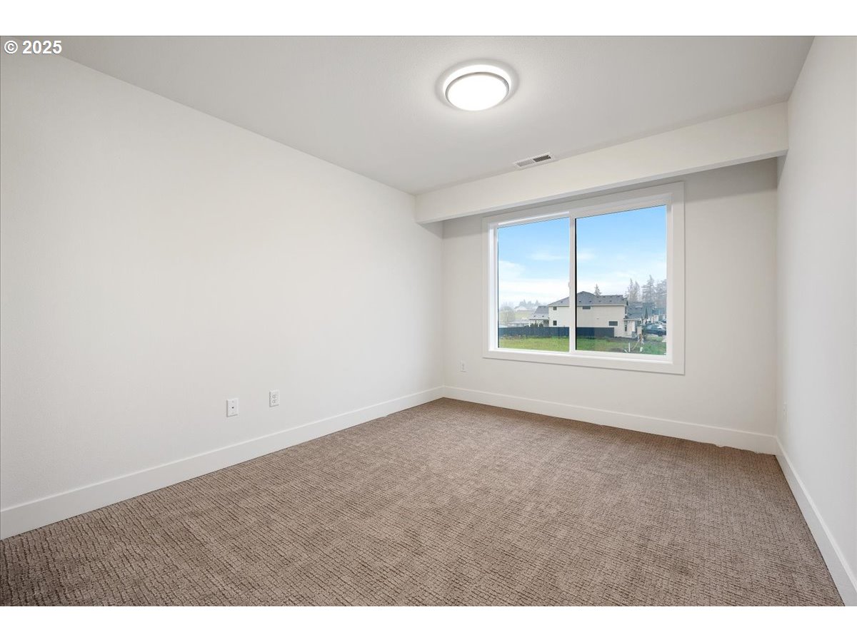 3510 North 11th Circle Ridgefield, WA 98642 - Photo 33 of 47 an empty room with windows