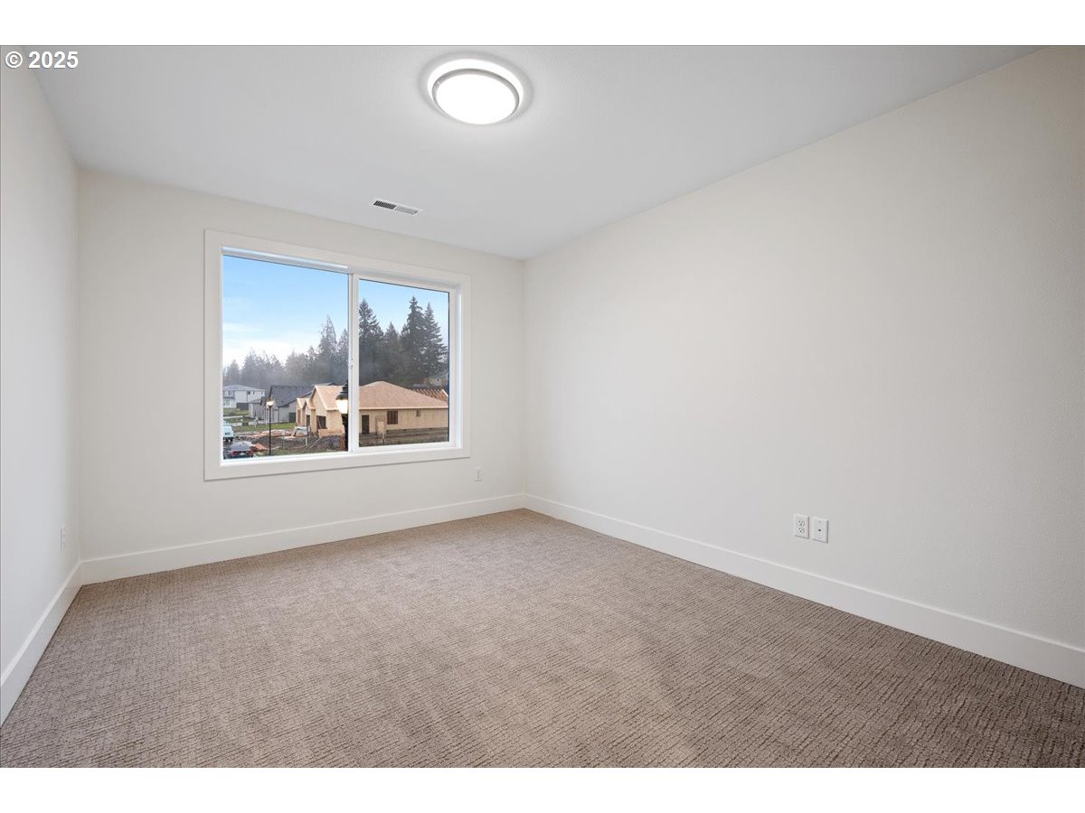 3510 North 11th Circle Ridgefield, WA 98642 - Photo 34 of 47 a view of an empty room and window