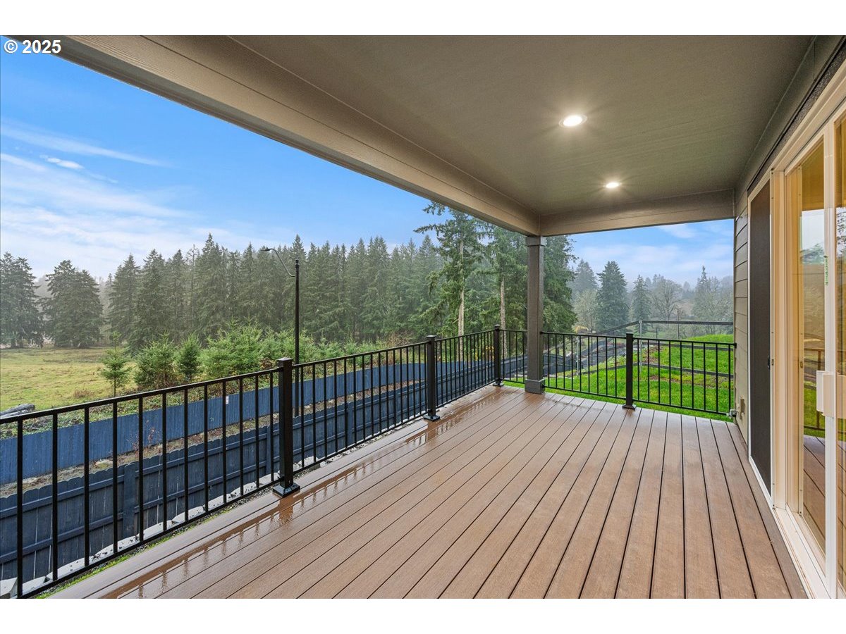 3510 North 11th Circle Ridgefield, WA 98642 - Photo 38 of 47 a view of balcony with wooden floor and fence