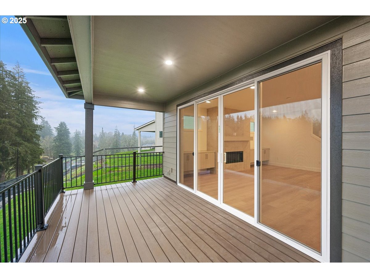 3510 North 11th Circle Ridgefield, WA 98642 - Photo 39 of 47 a view of balcony with floor to ceiling window