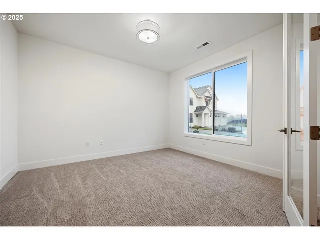 a view of an empty room with window