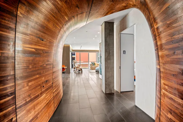 a kitchen with a sink and refrigerator
