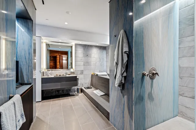 a view of a swimming pool with an ocean view