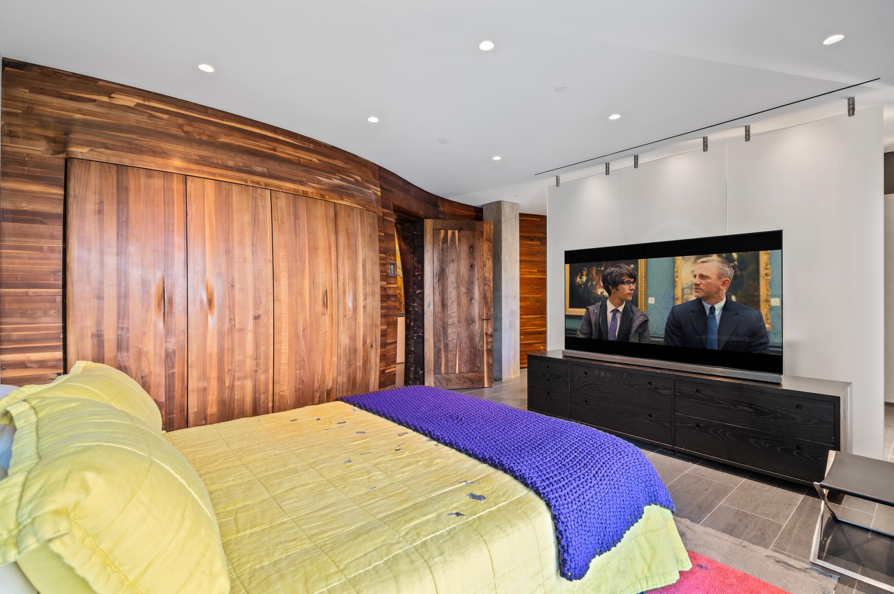 2 North Breakers Row, Unit N25 Palm Beach, FL 33480 - Photo 30 of 79 a bed room with a bed and a television