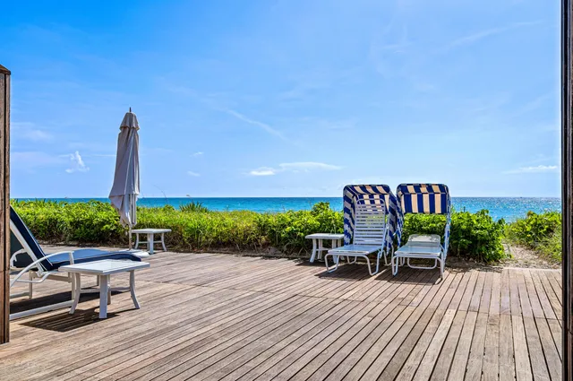 a view of a lake with a yard