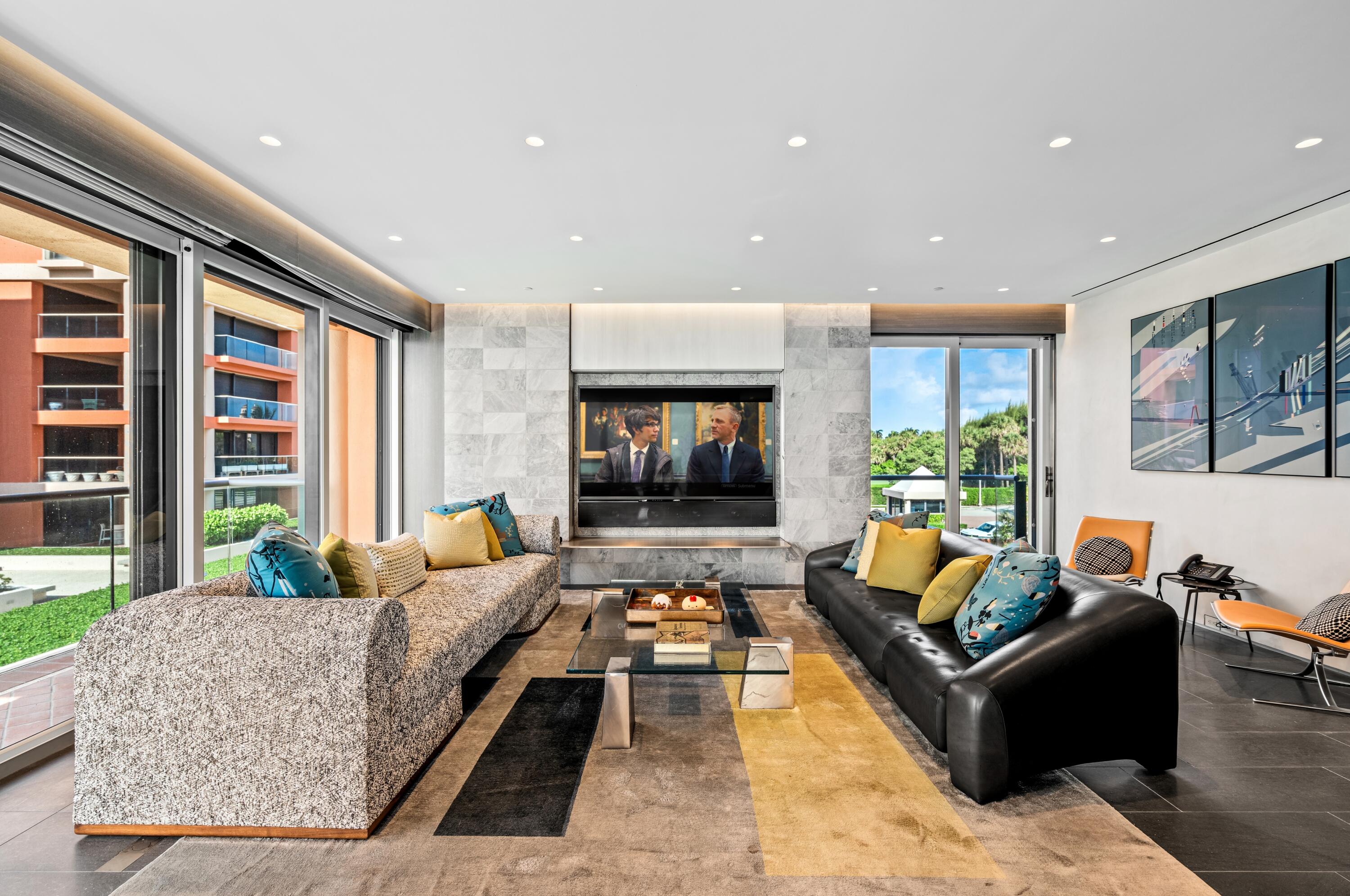 2 North Breakers Row, Unit N25 Palm Beach, FL 33480 - Photo 5 of 79 a living room with furniture and a flat screen tv