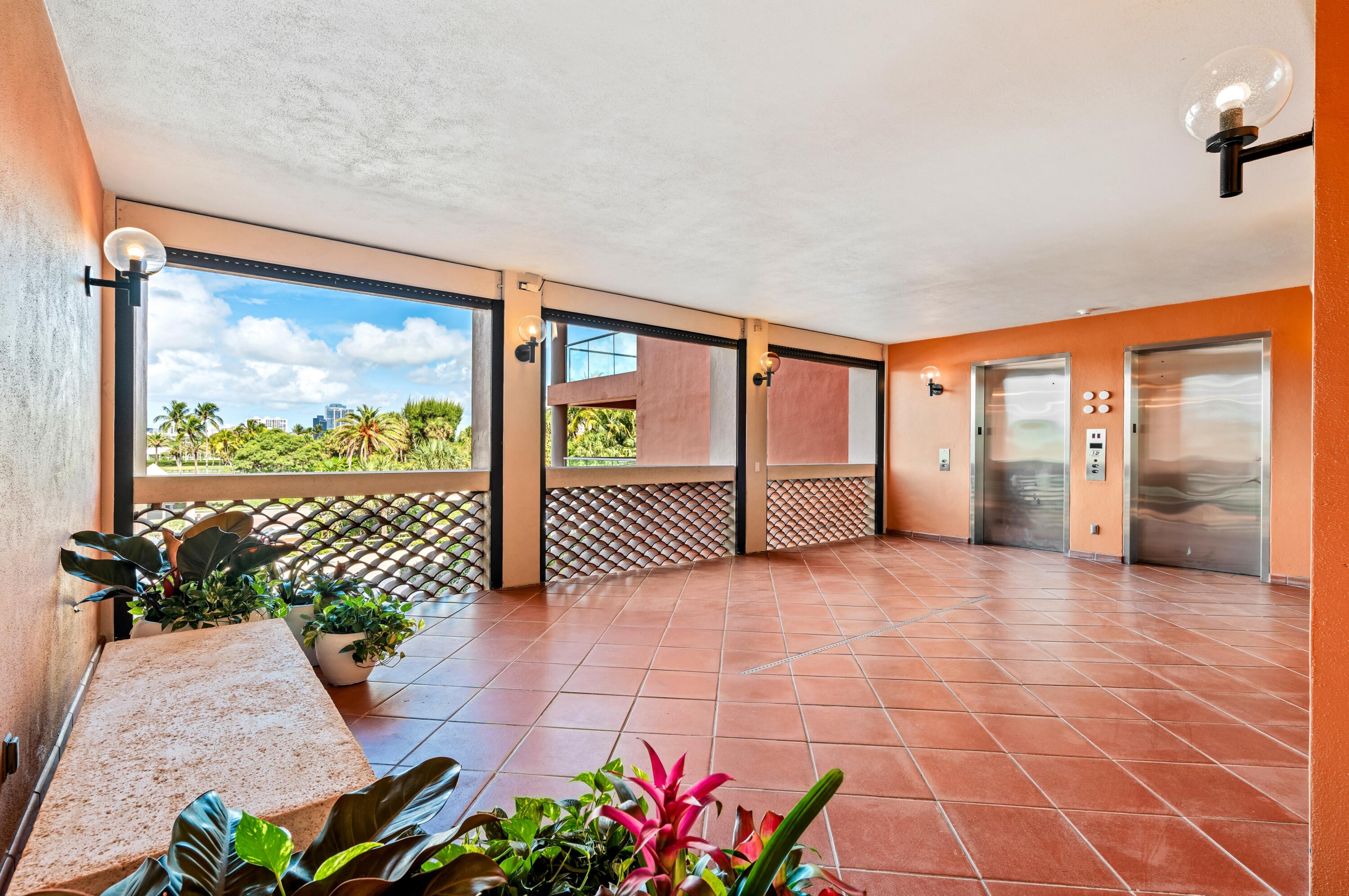 2 North Breakers Row, Unit N25 Palm Beach, FL 33480 - Photo 73 of 79 mls_COURTYARD_TO_ELEVATOR_DT