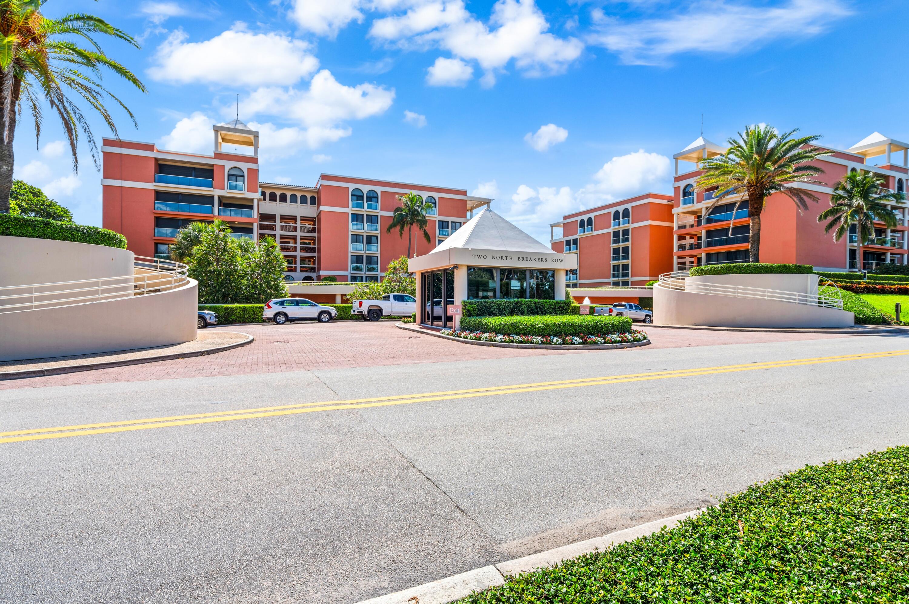 2 North Breakers Row, Unit N25 Palm Beach, FL 33480 - Photo 77 of 79 a front view of multiple houses with yard