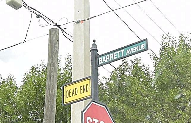 3125 Barrett Avenue Naples, FL 34112 - Photo 12 of 14 a street sign on a pole on a street