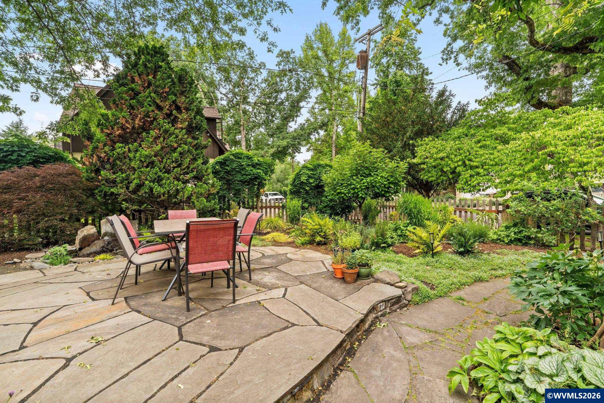 444 Northwest 35th Street Corvallis, OR 97330 - Photo 33 of 40 a backyard of a house with a table and chairs