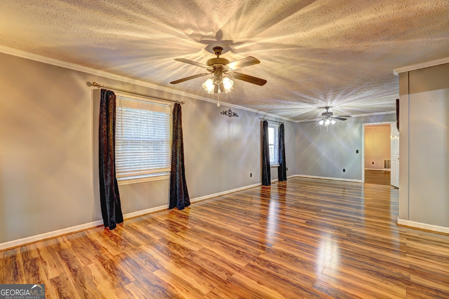 218 City Pond Road Barnesville, GA 30204 - Photo 29 of 51 a view of empty room with wooden floor