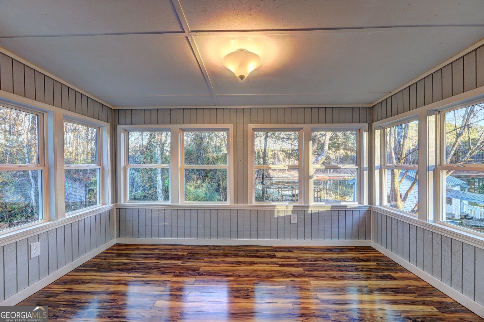 218 City Pond Road Barnesville, GA 30204 - Photo 39 of 51 a view of an empty room with wooden floor and a window